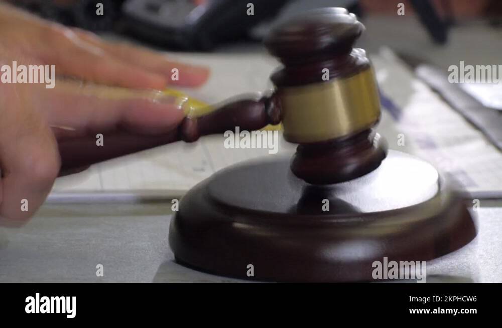 Traditional Courtroom Judge uses and smacks a Wooden Gavel with hand Stock Video Footage Alamy