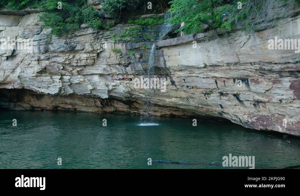 Cliff waterfall jumping Stock Videos & Footage HD and 4K Video Clips