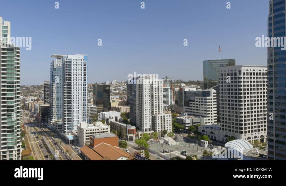 Airplane Flying Past Buildings In Downtown San Diego Stock Video ...