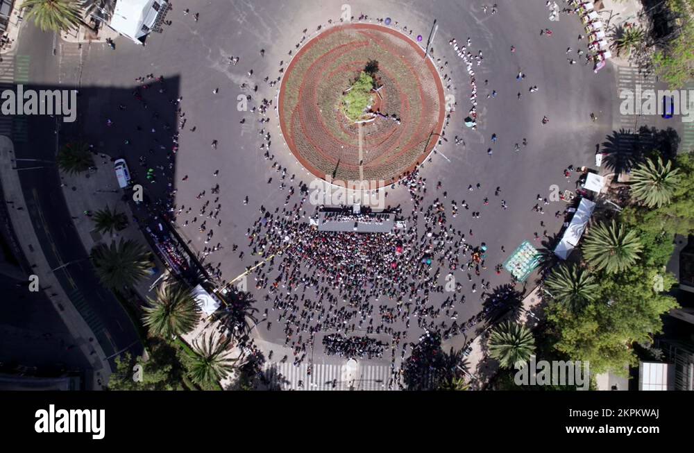 Aerial Birds Eye View Of Glorieta De La Palma Roundabout With Crowds To