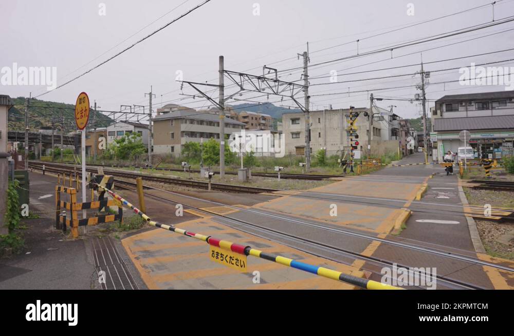 Japanese Railway Crossing at Road in Arashiyama, Kyoto. Waiting for ...