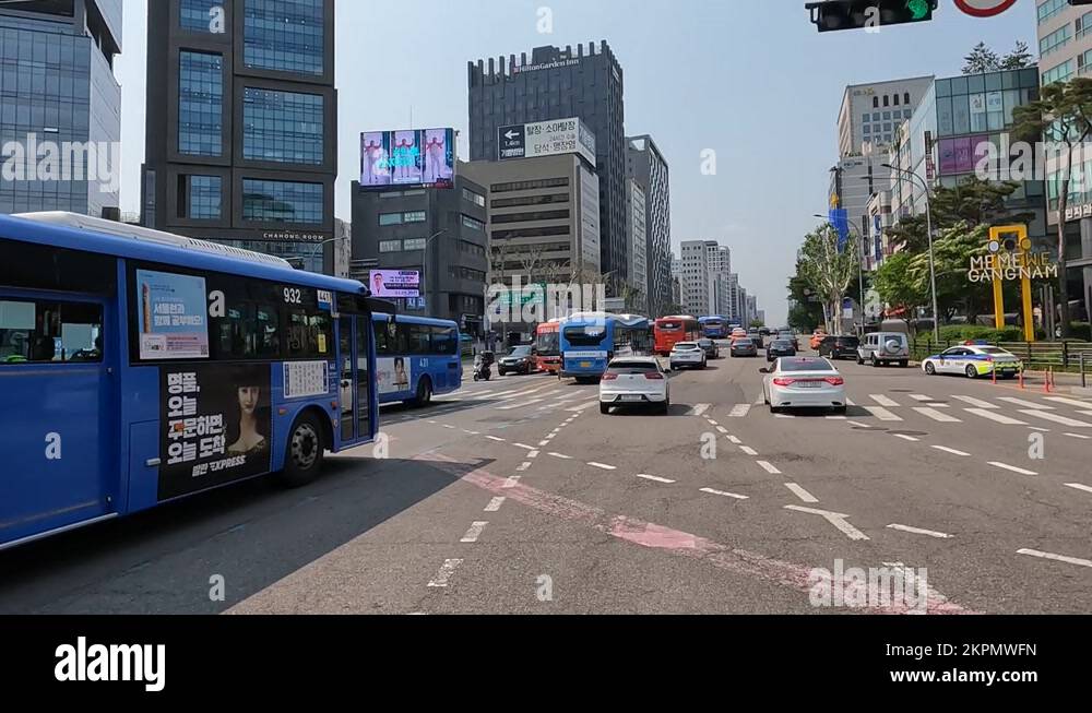 Driver's POV Driving As The Traffic Light Turns Green In The Main