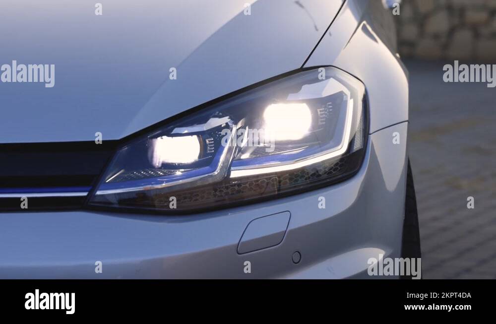 Car Headlights Flashing Led Lamp. Car with Headlight Flashing Smoothly