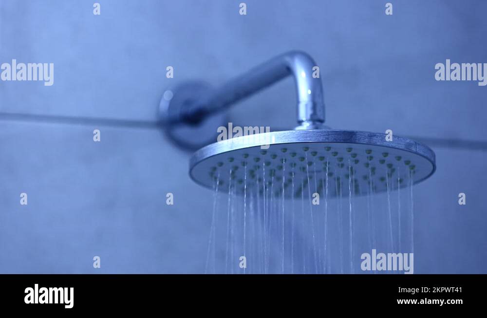 Closeup shot water drop from rain shower with dark and grain processed. shower Stock Video