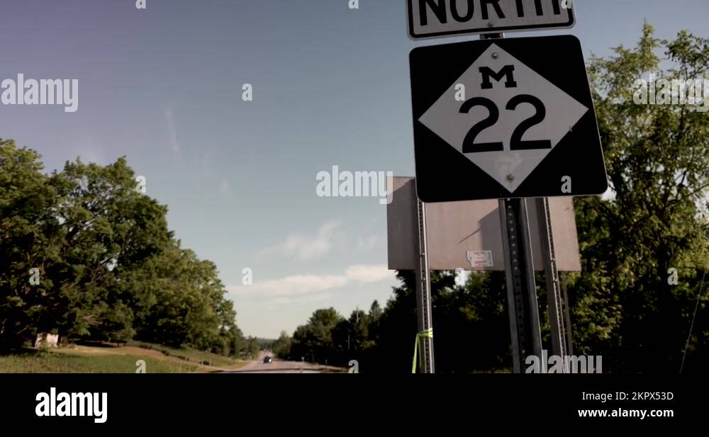 North M22 road sign in Michigan with video panning left to right ...