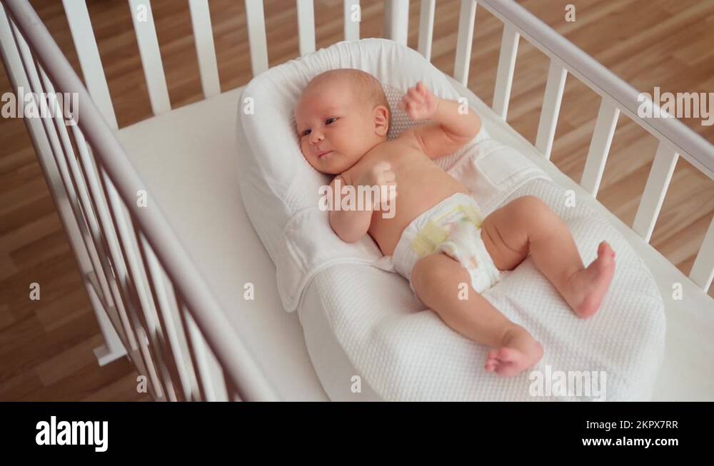 White baby boy lies in crib Stock Videos & Footage HD and 4K Video
