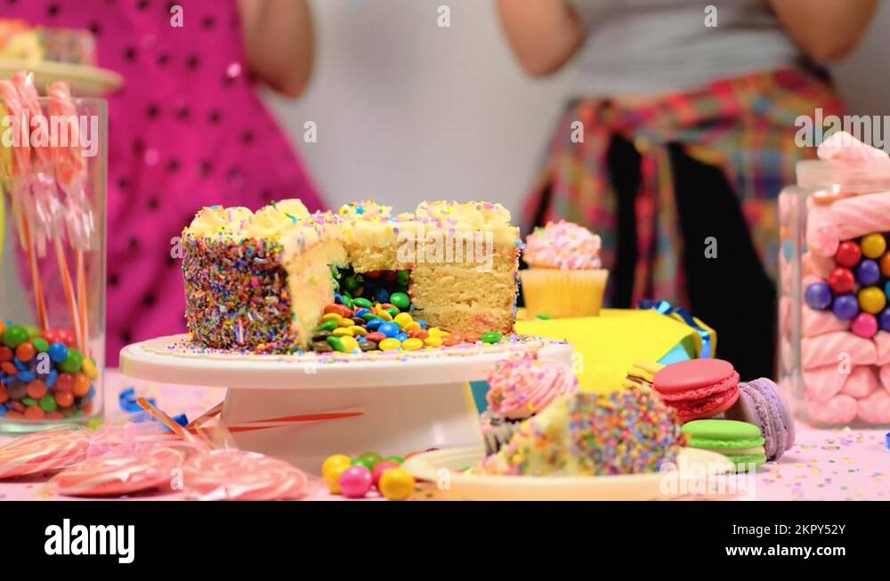 Birthday table with cake and decorations Stock Video Footage - Alamy