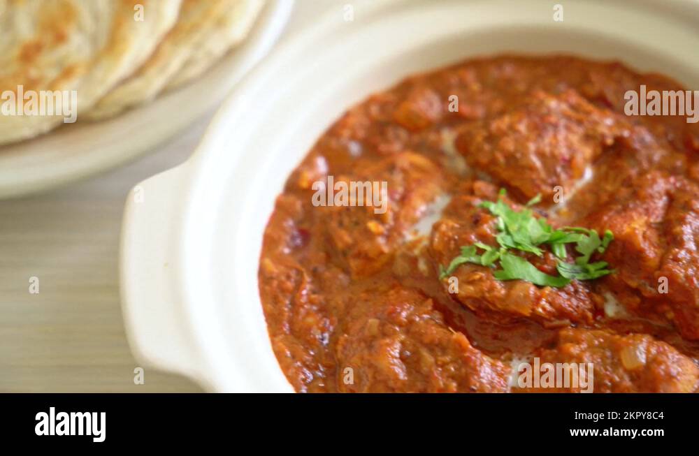 chicken tikka masala spicy curry meat food with roti or naan bread ...