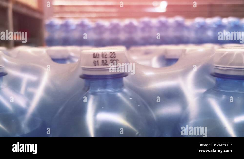 Twoliter bottles of mineral water packed in 6 bottles stand in