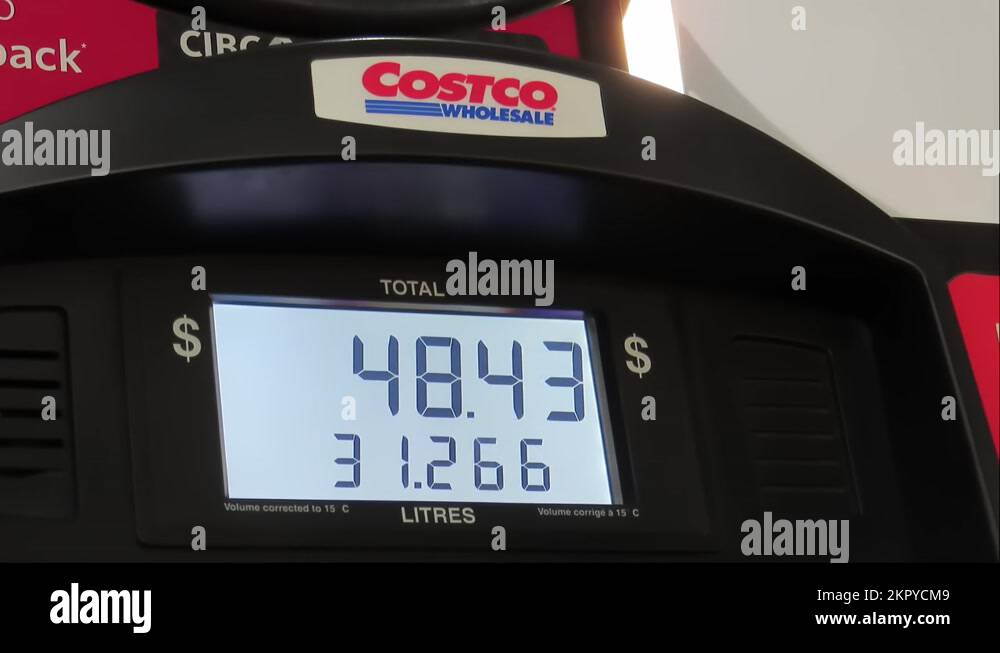 A gas pump monitor showing price and litres at a Costco gas station