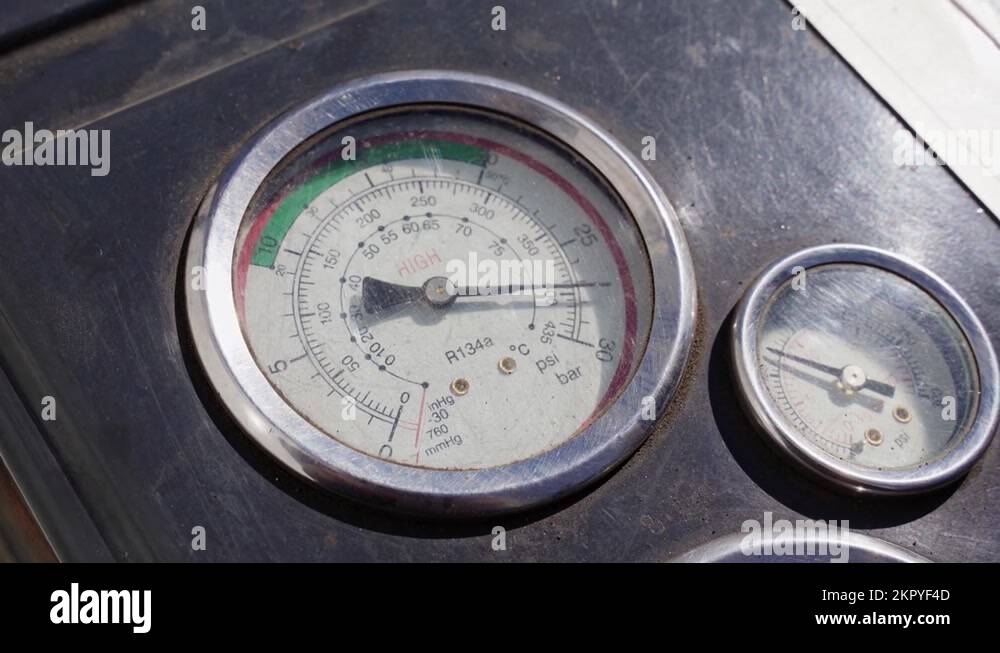 two round gauges with arrows showing the pressure on the device. one larger Stock Video Footage