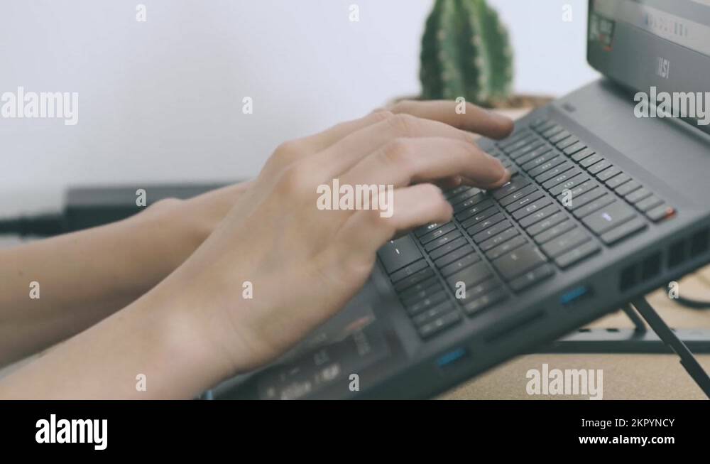 two hands write typing keys on a pc keyboard Stock Video Footage Alamy