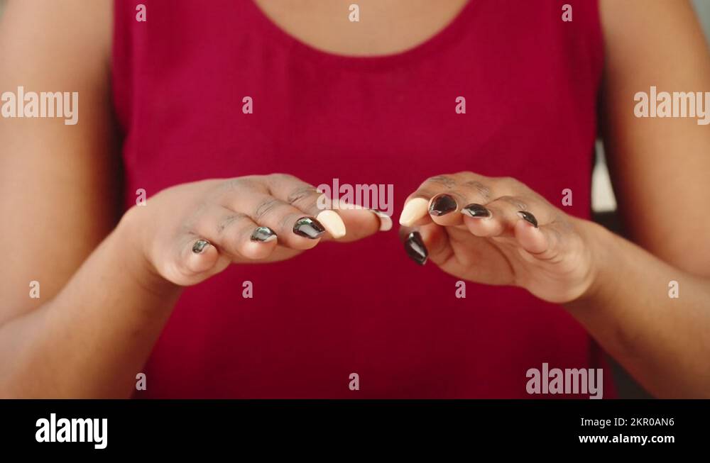 Nervous personwith tremor. Black skin texture closeup, shaking