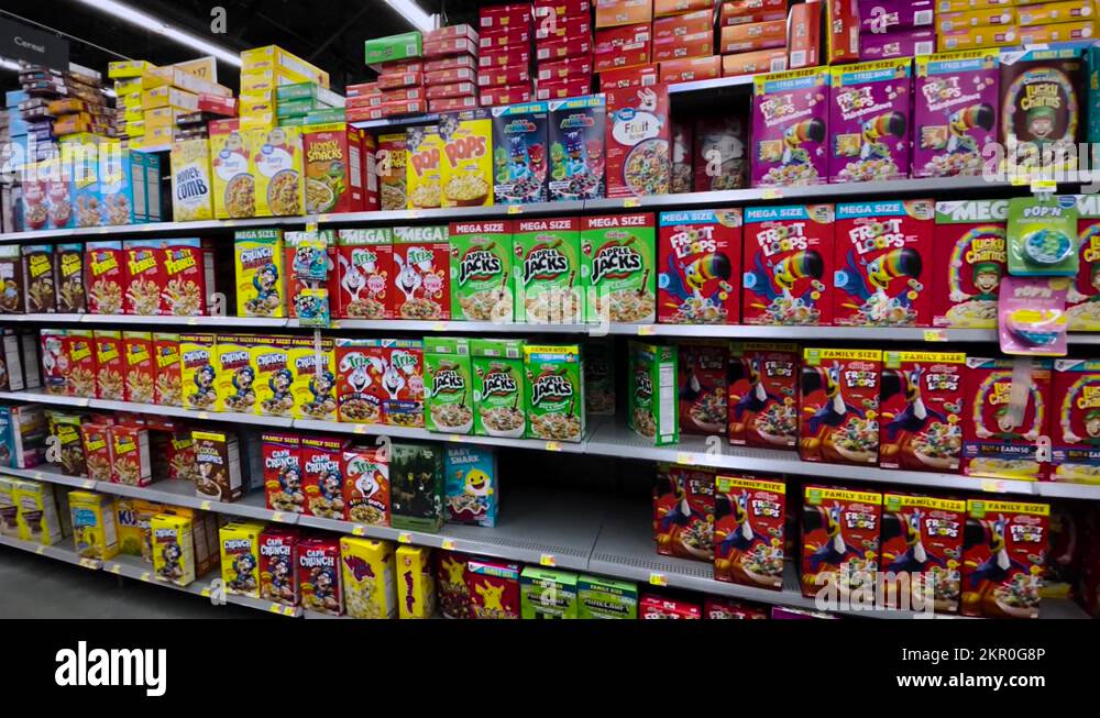 Walmart Retail grocery store interior cereal aisle wide pan Stock Video