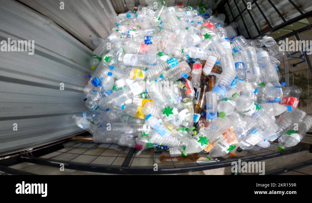 Plastic bottles in garbage trash pile for recycle Stock Video Footage