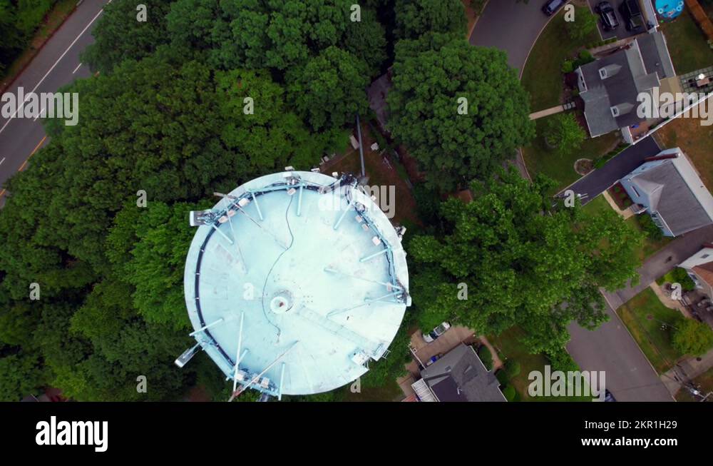 A top down view directly above a water tower in a residential ...