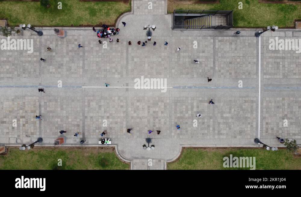 Top down drone video of a group of people in the middle of a park ...