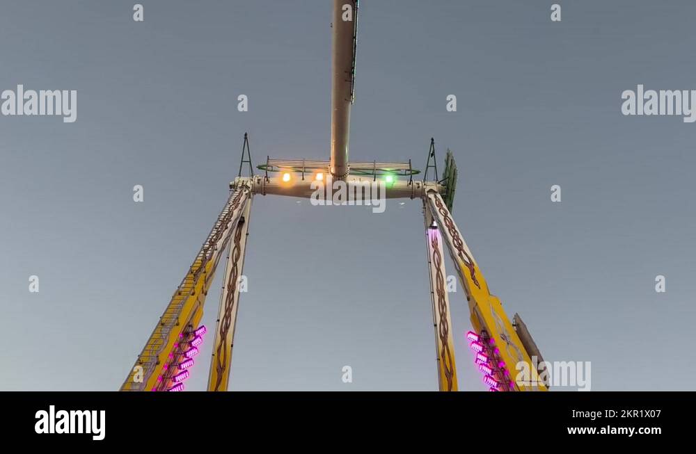 The beast swinging pendulum ride, passengers swinging back and forth in