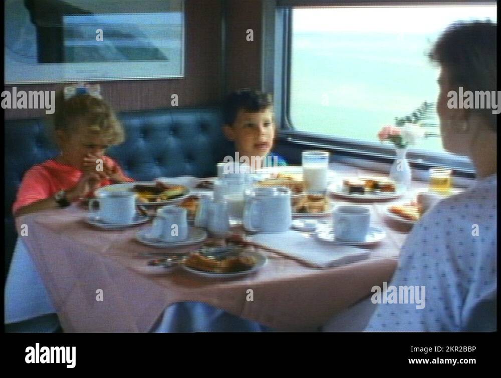 THE CANADIAN TRAIN, 1990, Train dining car, two children boy and girl