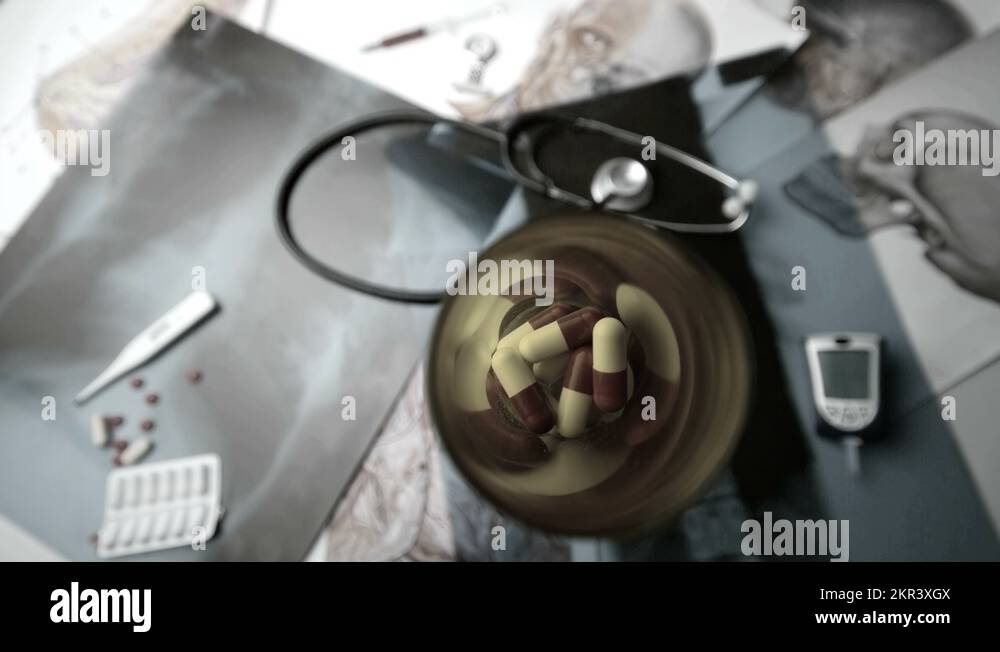 Pill bottle falling over x ray next to medical tools in black and white