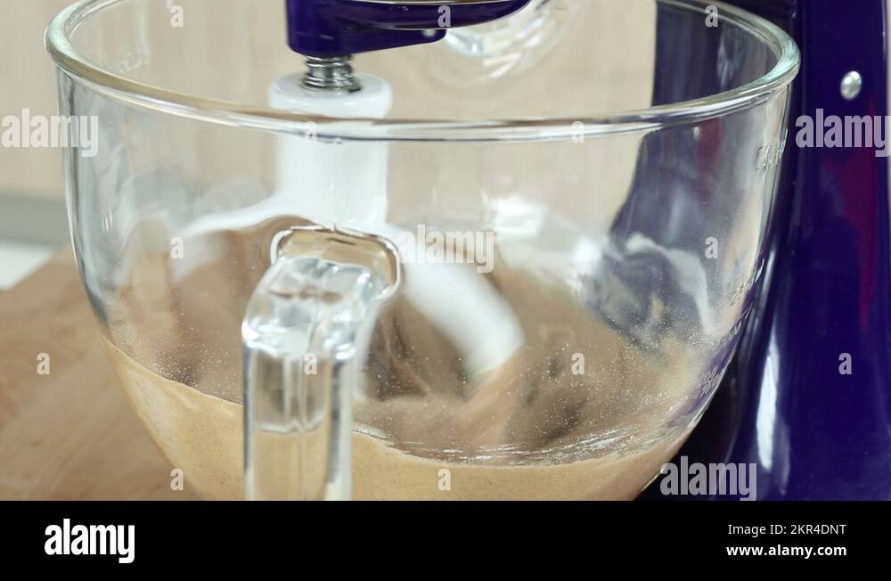 Carrot cake mixture being stirred with a food processor Stock Video