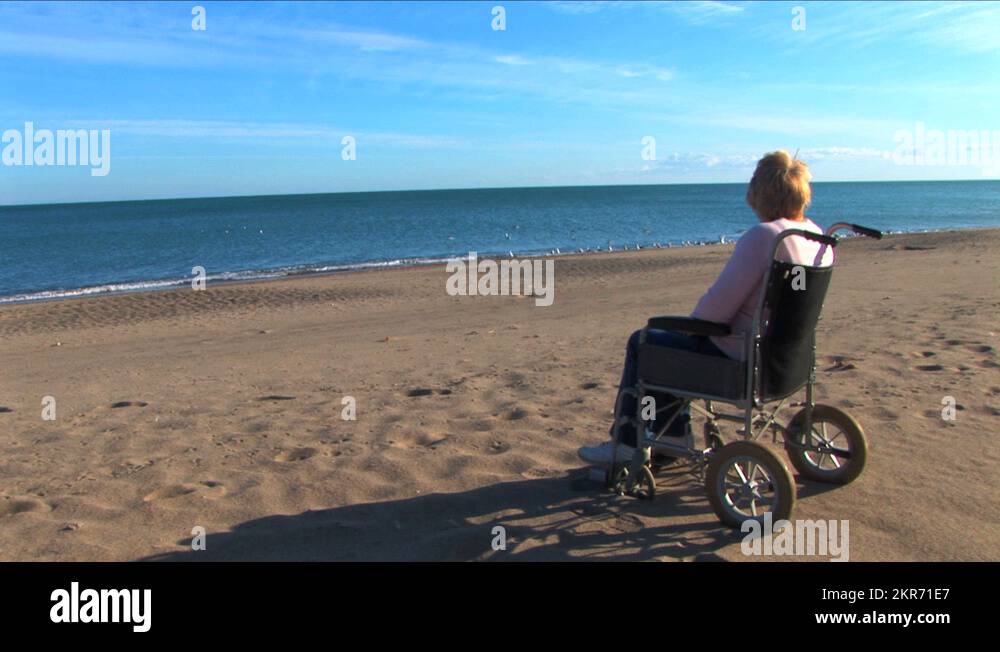 Disability mobility aids beach Stock Videos & Footage HD and 4K Video