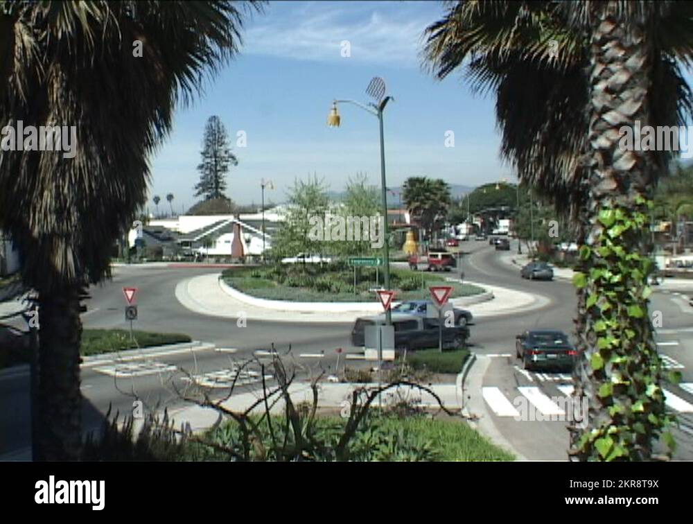 Traffic drives in a circle at an intersection Stock Video Footage Alamy