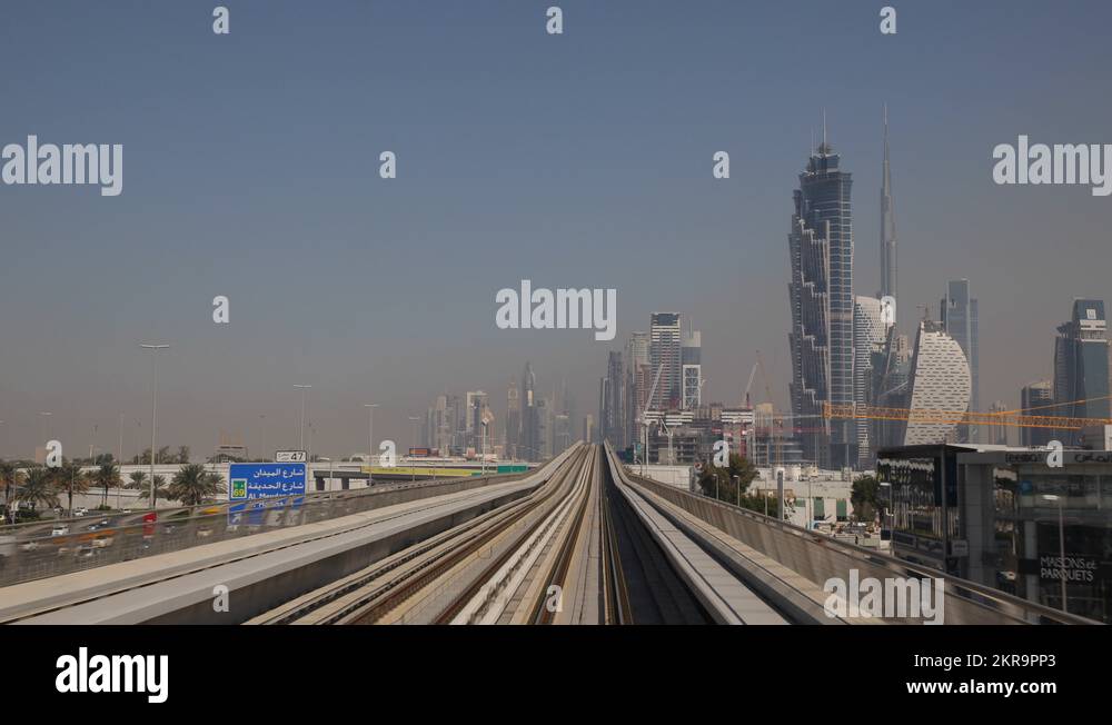 dubai-skyline-pov-metro-train-driving-jw-marriott-marquis-hotel-burj