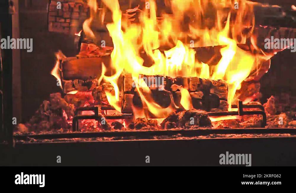 Fire flames and burning wood logs in fireplace Stock Video Footage Alamy
