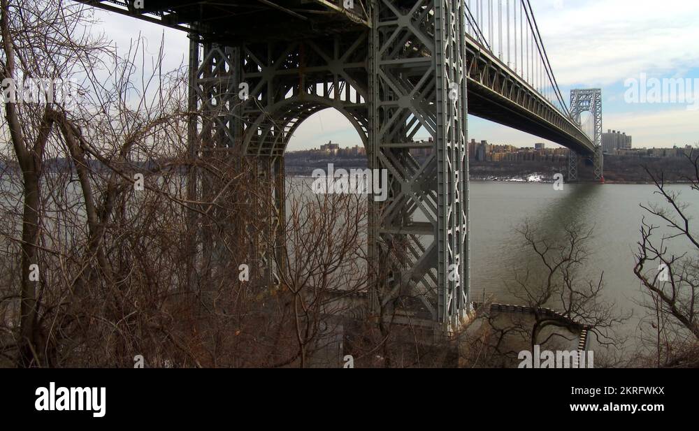 Tilt up reveals the Washington Bridge connecting New York to new Jersey Stock Video