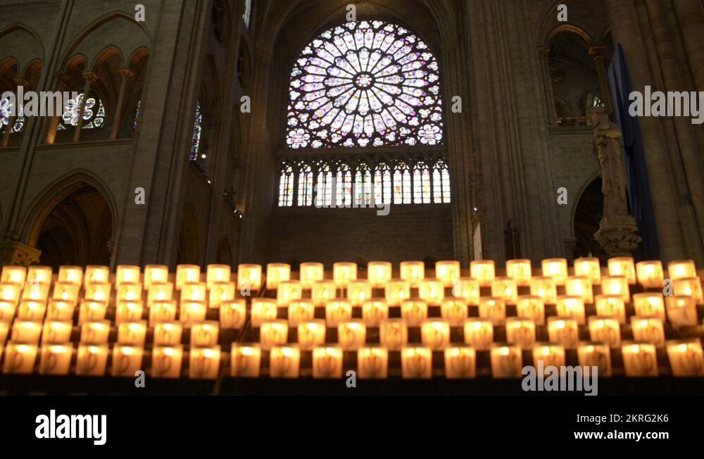Candles in notre dame de paris cathedral Stock Videos & Footage HD