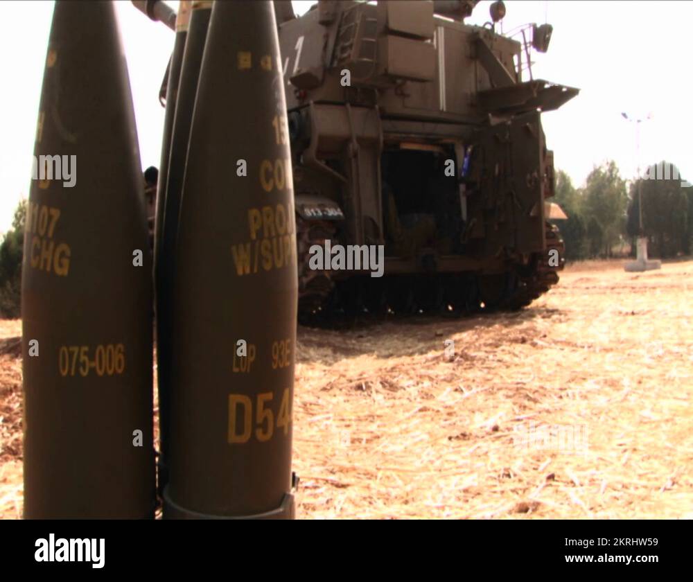 Artillery shells stand behind a tank in Israel Stock Video Footage Alamy