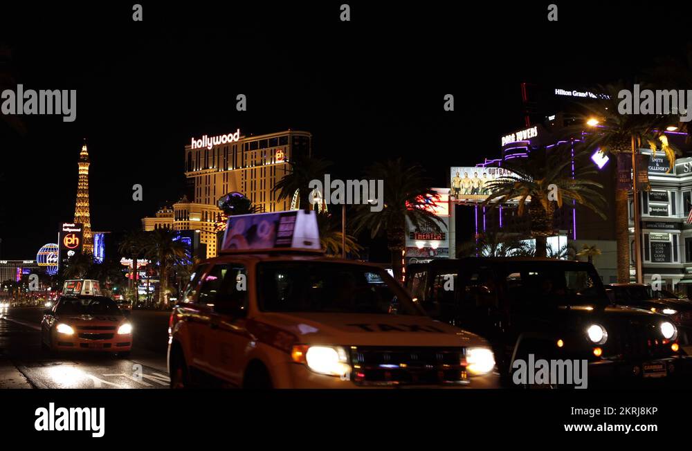 Taxi Cab Passing Car Traffic Center Las Vegas Strip Famous Hotel Casino