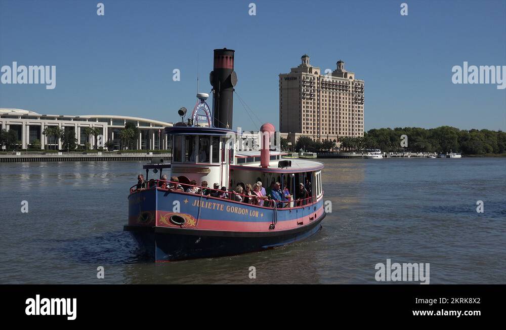ferry boat or river taxi arrives at waterfront, savannah, ga, usa Stock Video Footage Alamy
