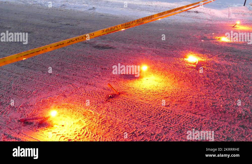 Police crime scene with flares on the ground and crime tape