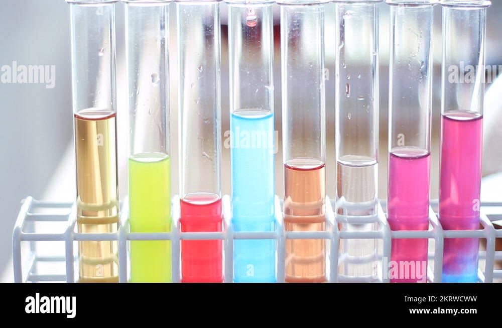 Drop falling from pipette into test tube Stock Videos & Footage HD
