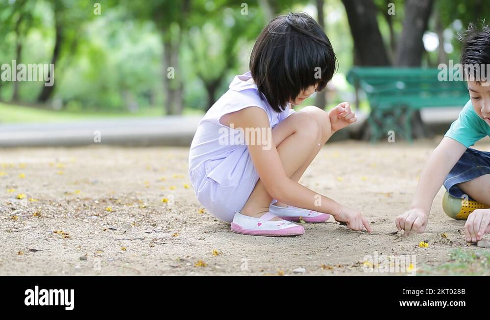 Kids playing outside in a park Stock Videos & Footage - HD and 4K Video ...