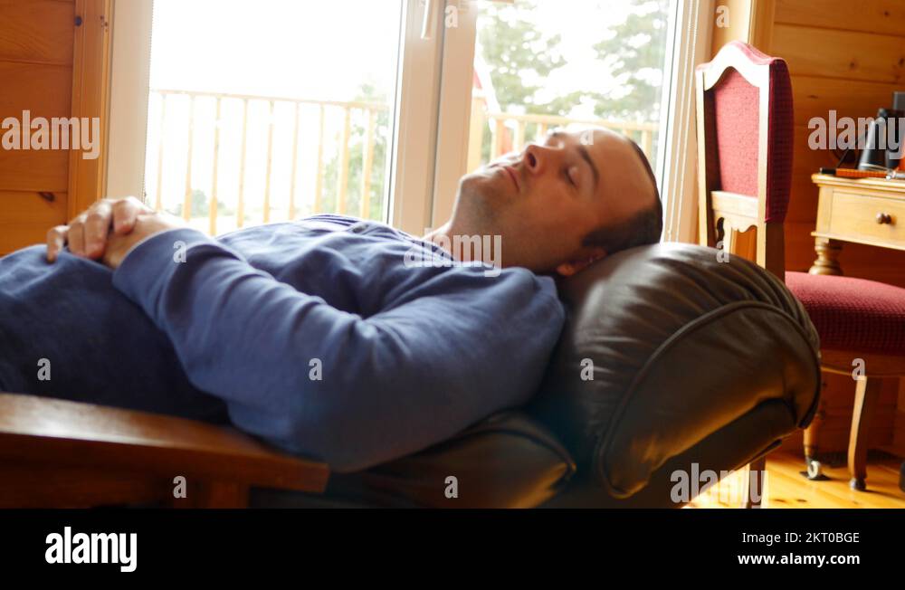 Man taking nap in lounge Stock Videos & Footage - HD and 4K Video Clips ...