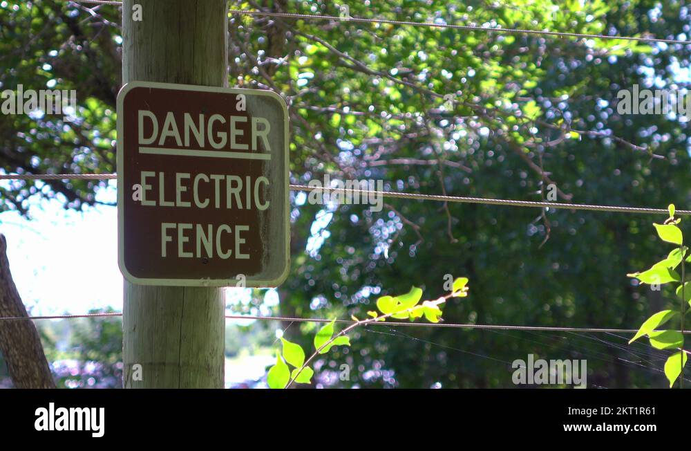 Danger Electric Fence sign 4k Stock Video Footage Alamy