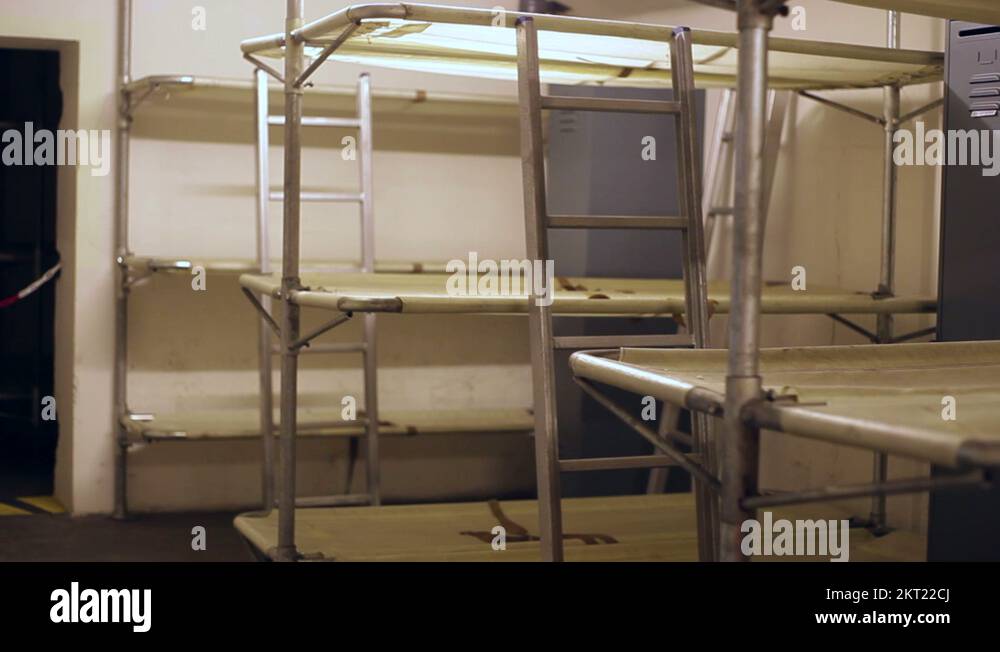 Bunk beds for soldiers inside a bunker Stock Video Footage Alamy