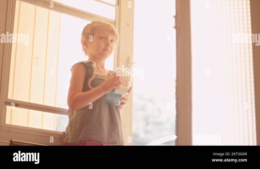 Little girl holds the door Stock Videos & Footage HD and 4K Video Clips Alamy