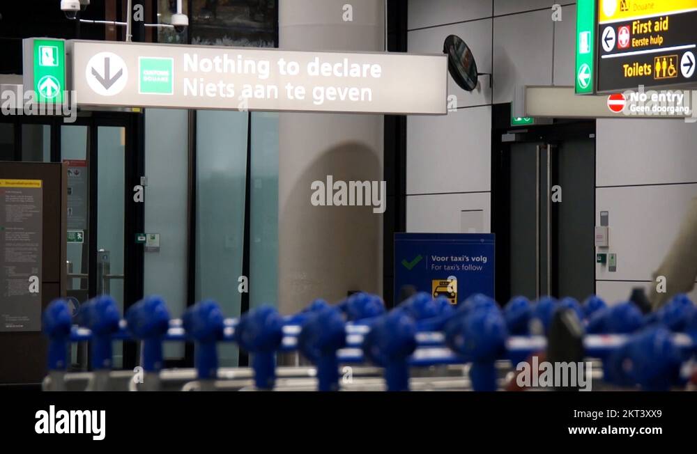 Airport nothing to declare sign man walking through the customs gate ...