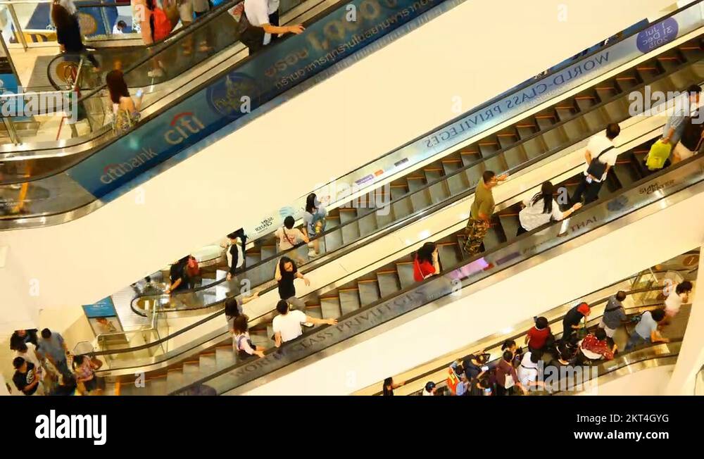 Escalator 4k shopping mall crowd of people buy shop center centre Stock ...