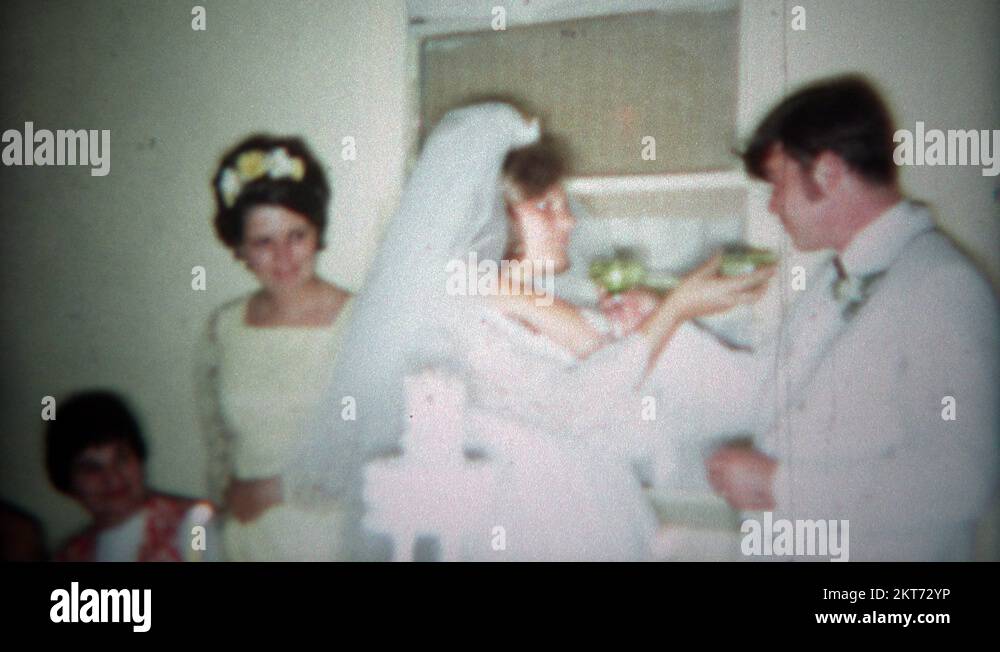 1966 Funny bride and groom ritual of feeding each other drinks