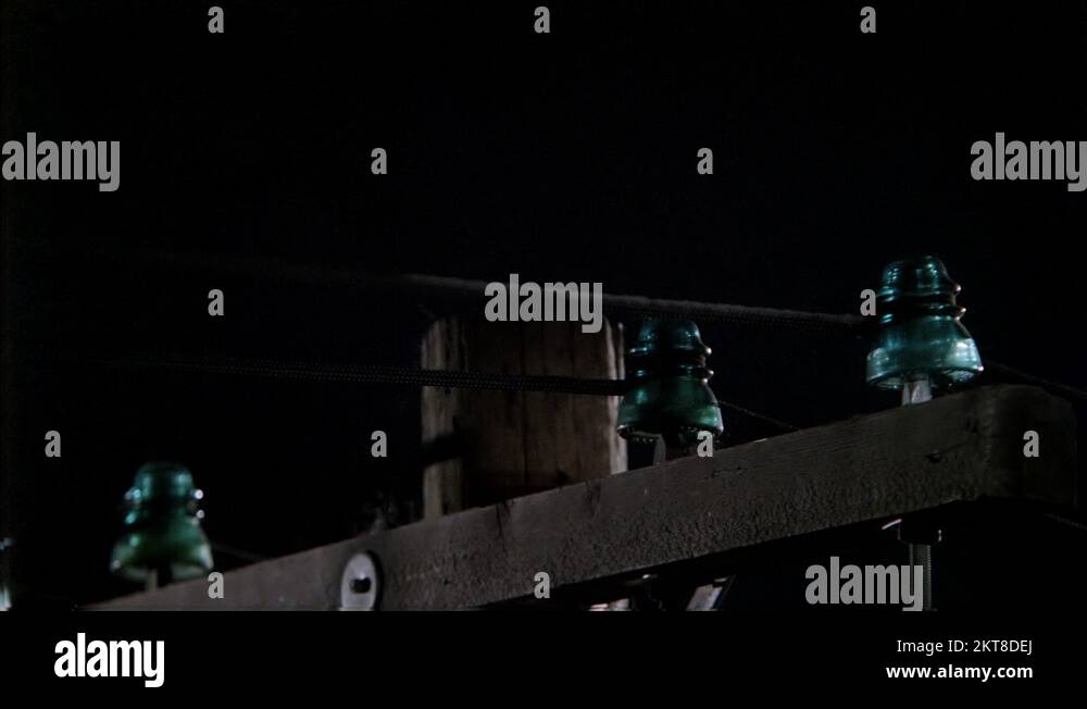 Lightning effect repeatedly striking telephone pole Stock Video Footage