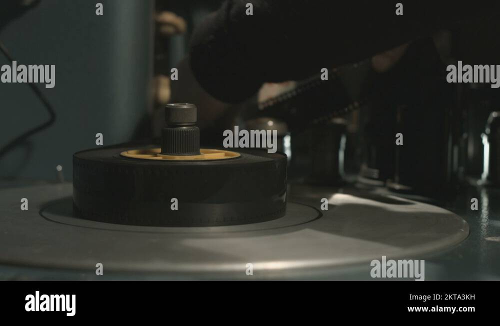 Archive film reel loading sequence in old film editing equipment Stock