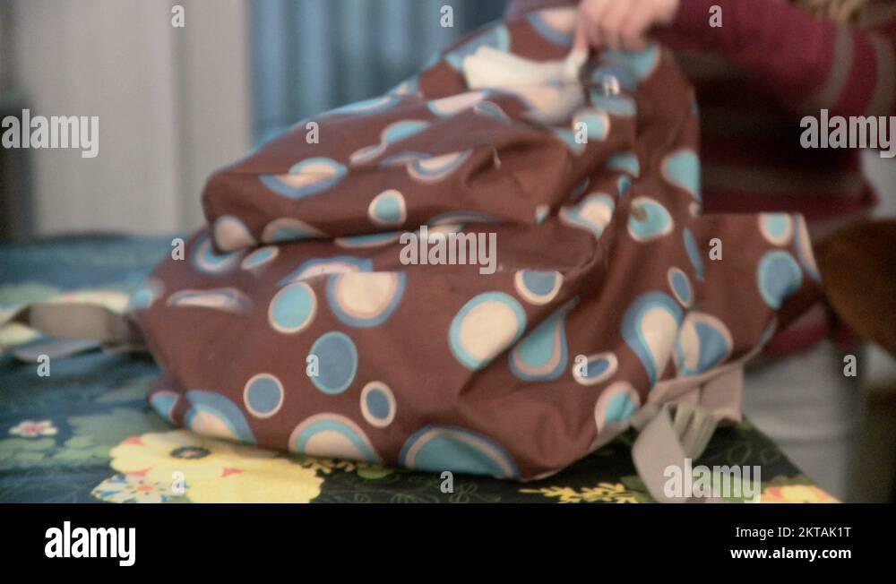 Mother and daughter packing bag and leaving for school Stock Video