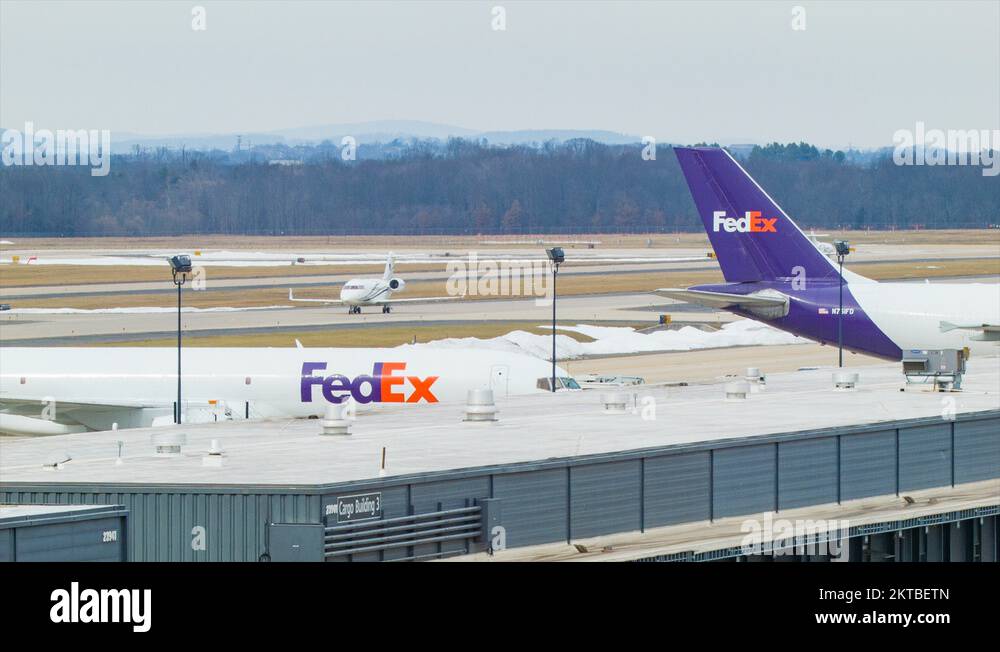 Business Jet Passing Fedex Cargo Terminal at Washington Dulles Airport