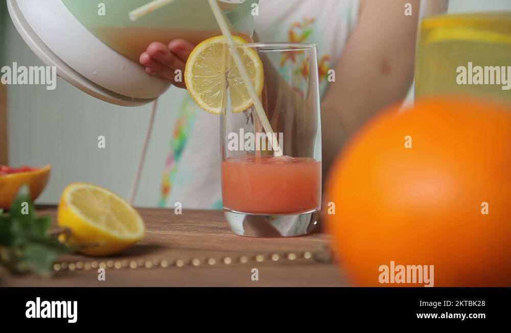 Girl pouring glass juice Stock Videos & Footage HD and 4K Video Clips