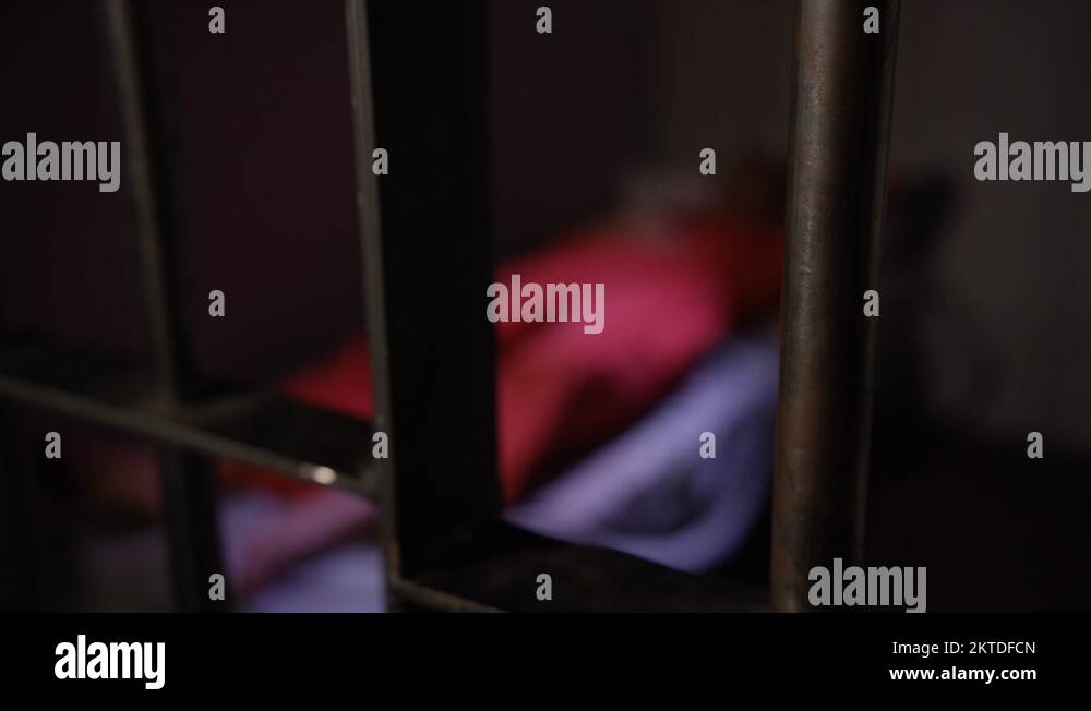 Modern Prison People in Jail for Crimes sleeping in cell Stock